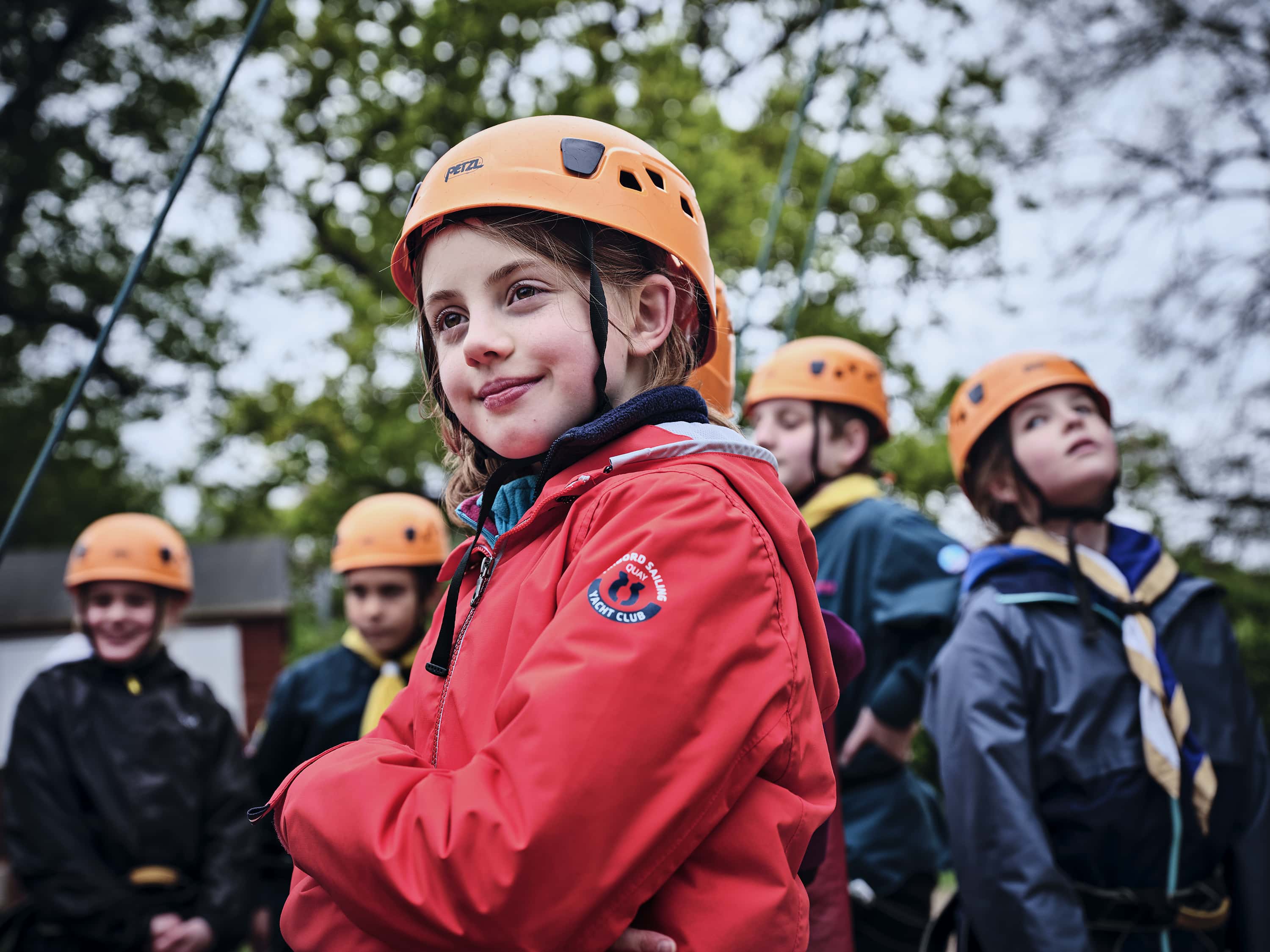 Group of scouts with helmets On